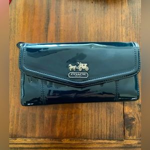Gently loved dark blue patent leather Coach wallet